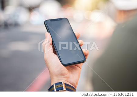 Phone, mockup and hands of man in a city with connection, contact and app for a location. Cellphone, screen and male online for directions, search internet and guide with network, street and travel Phone, mockup and hands of man in a city with connection, contact and app for a location. Cellphone, screen and male online for directions, search internet and guide with network, street and travel 136361231