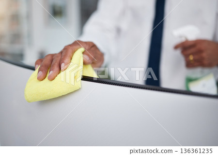 Person, hands and cleaning computer with cloth in office for hygiene, health or safety of virus. Closeup of business worker wipe dirty desktop monitor for sanitation, disinfection or bacteria of dust Person, hands and cleaning computer with cloth in office for hygiene, health or safety of virus. Closeup of business worker wipe dirty desktop monitor for sanitation, disinfection or bacteria of dust 136361235