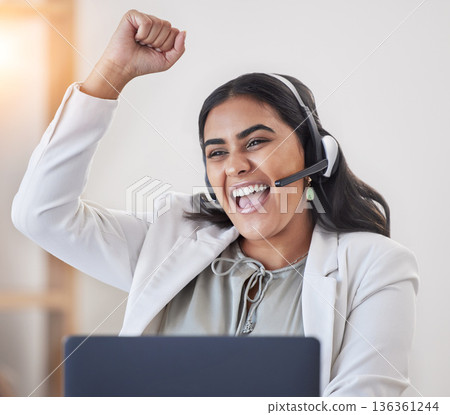 Excited, success and a woman in a call center with a laptop for telemarketing, sales goal and target. Happy, celebrate and a young customer service employee with a smile for a consulting achievement Excited, success and a woman in a call center with a laptop for telemarketing, sales goal and target. Happy, celebrate and a young customer service employee with a smile for a consulting achievement 136361244
