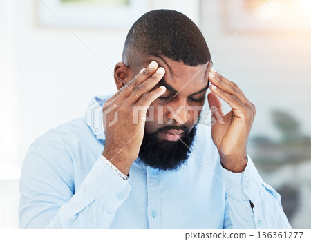 Stress, anxiety or tired businessman with headache overwhelmed by problems, mistake or failure. Stock market crash, burnout or frustrated black man trader overworked in office with fatigue or failure 136361277