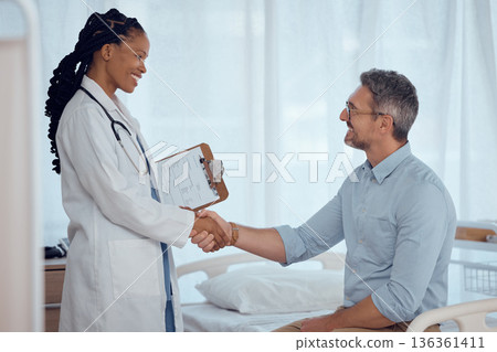 Doctor, happy patient and people shaking hands for hospital agreement, checkup success or healthy exam results. Clinic nurse, medicine expert and surgeon welcome, thank you and handshake with client Doctor, happy patient and people shaking hands for hospital agreement, checkup success or healthy exam results. Clinic nurse, medicine expert and surgeon welcome, thank you and handshake with client 136361411