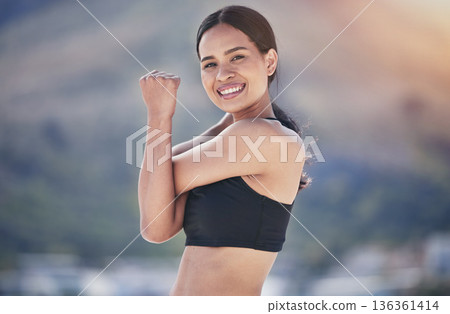 Fitness, portrait and happy woman stretching arm outdoor for running, training or morning cardio routine on blurred background. Face, smile and female runner with shoulder stretch exercise or warm up Fitness, portrait and happy woman stretching arm outdoor for running, training or morning cardio routine on blurred background. Face, smile and female runner with shoulder stretch exercise or warm up 136361414