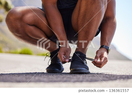 Running, hands or person on road with shoes for fitness exercise, workout and marathon training. Closeup, tying lace or athlete runner ready to run, walk or jog with sneakers, trainers or footwear Running, hands or person on road with shoes for fitness exercise, workout and marathon training. Closeup, tying lace or athlete runner ready to run, walk or jog with sneakers, trainers or footwear 136361557