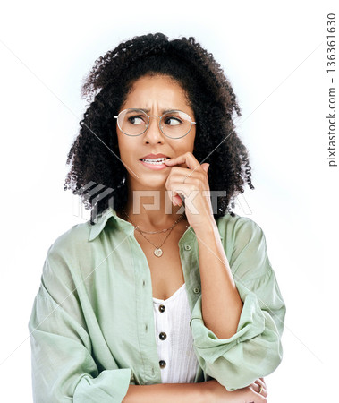 Bite finger, thinking and face of woman on a white background with worry, doubt and uncertain. Anxiety, confused and female person worried, anxious and unsure for problem, crisis and choice in studio Bite finger, thinking and face of woman on a white background with worry, doubt and uncertain. Anxiety, confused and female person worried, anxious and unsure for problem, crisis and choice in studio 136361630