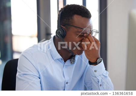 Customer support, call center burnout or black man stress over communication mistake, networking problem or anxiety. Fatigue, tired or African insurance agent, person or consultant with headache pain Customer support, call center burnout or black man stress over communication mistake, networking problem or anxiety. Fatigue, tired or African insurance agent, person or consultant with headache pain 136361658