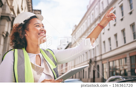 Happy woman, architect and tablet pointing in city for construction, building or outdoor planning on site. Female person, engineer or contractor smile and technology for industrial urban architecture Happy woman, architect and tablet pointing in city for construction, building or outdoor planning on site. Female person, engineer or contractor smile and technology for industrial urban architecture 136361720
