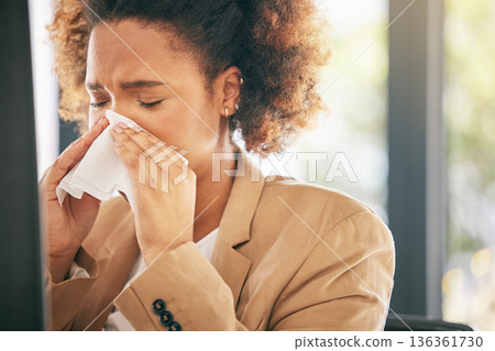 Business woman, sneeze and blowing nose with allergies, sick with virus or health issue while working at office. Corporate female, allergy and hayfever with illness, cold and flu with sinus problem 136361730