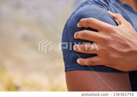 Sports man, runner and shoulder pain from workout training injury or fitness cardio running accident outdoor. Hand, arm muscle or closeup of injured male athlete with exercise emergency in nature Sports man, runner and shoulder pain from workout training injury or fitness cardio running accident outdoor. Hand, arm muscle or closeup of injured male athlete with exercise emergency in nature 136361758
