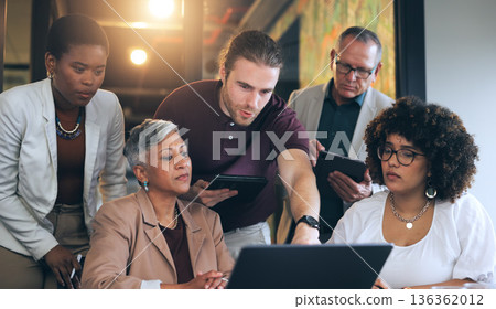 Business people, laptop and coaching in teamwork, planning or training staff together at office. Businessman, coach or mentor showing employees in team strategy, ideas or project plan at workplace Business people, laptop and coaching in teamwork, planning or training staff together at office. Businessman, coach or mentor showing employees in team strategy, ideas or project plan at workplace 136362012