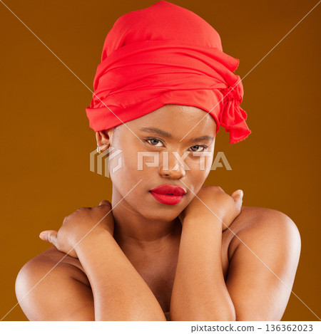 Young beauty, wrap and portrait with scarf, red lipstick and girl wellness in studio. Yellow background, female person and self care cosmetics with model and makeup for skincare and facial glow Young beauty, wrap and portrait with scarf, red lipstick and girl wellness in studio. Yellow background, female person and self care cosmetics with model and makeup for skincare and facial glow 136362023
