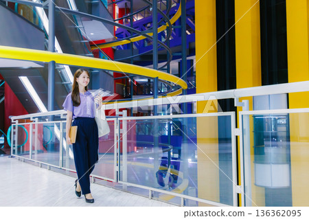 Women walking shopping mall Women walking shopping mall 136362095