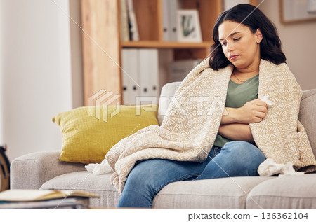 Sick, allergy and tired with woman on sofa for virus, hayfever or illness. Healthcare, disease and allergies with person and sneezing with tissue in living room at home for influenza, cold and sinus Sick, allergy and tired with woman on sofa for virus, hayfever or illness. Healthcare, disease and allergies with person and sneezing with tissue in living room at home for influenza, cold and sinus 136362104