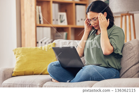 Remote work, laptop and woman with a headache, stress and exhausted with health issue, home and burnout. Female person, freelancer and journalist with a migraine, overworked and pain with fatigue Remote work, laptop and woman with a headache, stress and exhausted with health issue, home and burnout. Female person, freelancer and journalist with a migraine, overworked and pain with fatigue 136362115