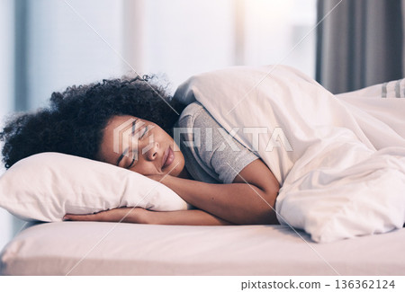 Sleeping, woman and bed with nap at home in morning with rest feeling calm with peace. House, bedroom and tired female person relax and comfortable on a pillow with blanket dreaming over the weekend 136362124