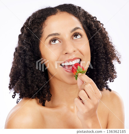 Healthy, eating or happy woman with strawberry in studio on white background for clean diet nutrition. Smile, looking up or girl model thinking of beauty or natural fruits for nutrition or wellness Healthy, eating or happy woman with strawberry in studio on white background for clean diet nutrition. Smile, looking up or girl model thinking of beauty or natural fruits for nutrition or wellness 136362185