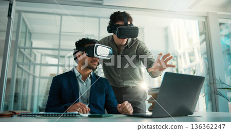 Business, people and laptop with vr headset in office for training, simulation and developer. Men, demonstration and virtual reality tech for interactive design, app development and user experience Business, people and laptop with vr headset in office for training, simulation and developer. Men, demonstration and virtual reality tech for interactive design, app development and user experience 136362247