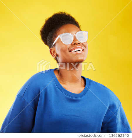 Happy, smile and glasses with face of black woman in studio for vision, eye care and confidence. Gen z, fashion and happiness with female person on yellow background for health and creative style Happy, smile and glasses with face of black woman in studio for vision, eye care and confidence. Gen z, fashion and happiness with female person on yellow background for health and creative style 136362340