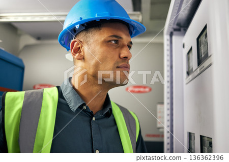 Electrician, engineering and technician with man in control room for inspection, quality assurance and energy. Electricity, safety and industrial with handyman for maintenance, check and power box Electrician, engineering and technician with man in control room for inspection, quality assurance and energy. Electricity, safety and industrial with handyman for maintenance, check and power box 136362396