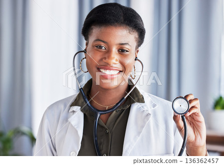 Doctor, portrait and black woman with stethoscope for heartbeat, healthcare services and cardiology. Face, African female medical worker and listening tools to check heart, lungs and breathing test Doctor, portrait and black woman with stethoscope for heartbeat, healthcare services and cardiology. Face, African female medical worker and listening tools to check heart, lungs and breathing test 136362457