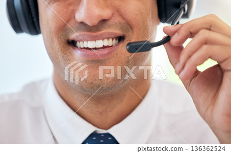 Happy man, smile and headphones with mic in call center for customer service, support or telemarketing at office. Closeup of male person, consultant or agent mouth for friendly online advice or help Happy man, smile and headphones with mic in call center for customer service, support or telemarketing at office. Closeup of male person, consultant or agent mouth for friendly online advice or help 136362524