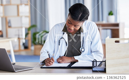 Black woman, doctor and writing on clipboard in clinic, planning documents and schedule in medical office. Female healthcare worker, medicine notes and report of insurance checklist, script and info Black woman, doctor and writing on clipboard in clinic, planning documents and schedule in medical office. Female healthcare worker, medicine notes and report of insurance checklist, script and info 136362525