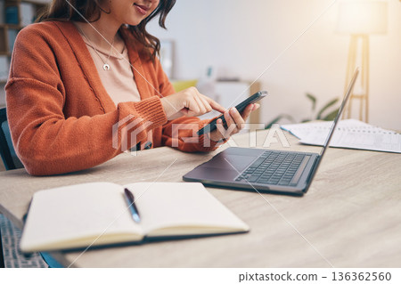 Hands, phone and notebook with texting, woman or laptop for planning, schedule or networking at desk. Entrepreneur, smartphone and click app for note, research or work from home in web journalist job Hands, phone and notebook with texting, woman or laptop for planning, schedule or networking at desk. Entrepreneur, smartphone and click app for note, research or work from home in web journalist job 136362560