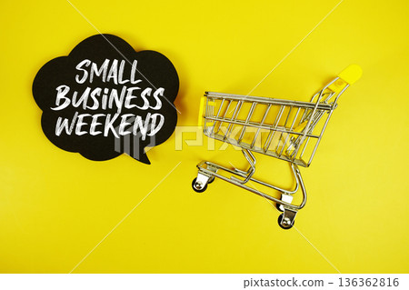 Small Business Weekend text with trolley shopping cart on yellow background Small Business Weekend text with trolley shopping cart on yellow background 136362816