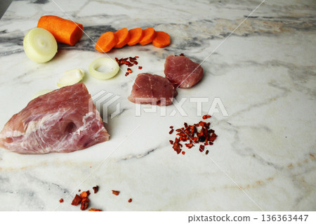 beef with spices and vegetables on the table. Homemade food 136363447