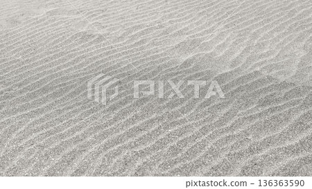 Fine sand surface with natural wind wave pattern forming minimal texture in cloud dancer color used as background, mockup for design. Natural sand texture, neutral surface, copy space, background 136363590