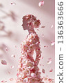 Elegant female profile shaped from pink cherry blossoms, petals floating across a soft pastel background 136363666