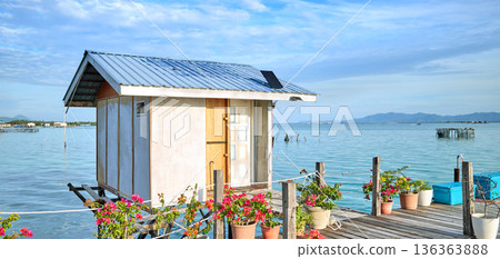 Cabin on a wooden platform over water, Semporna district, Borneo, Malaysia. Cabin on a wooden platform over water, Semporna district, Borneo, Malaysia. 136363888