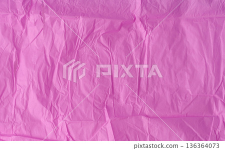 Crumpled texture of pink tissue paper, chaotic folds Crumpled texture of pink tissue paper, chaotic folds 136364073