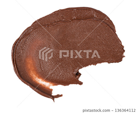 Chocolate cream wide brush smear isolated on white Chocolate cream wide brush smear isolated on white 136364112