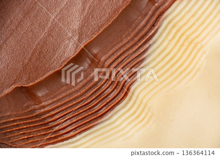 Chocolate cream texture background with dark and white layers Chocolate cream texture background with dark and white layers 136364114