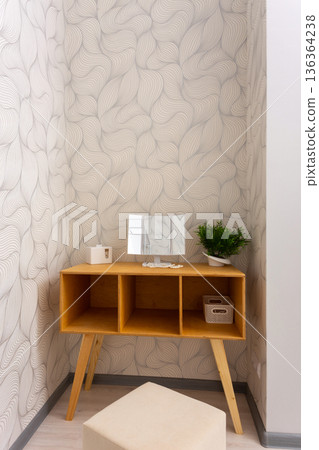 Minimal dressing room interior with open clothing rack 136364238
