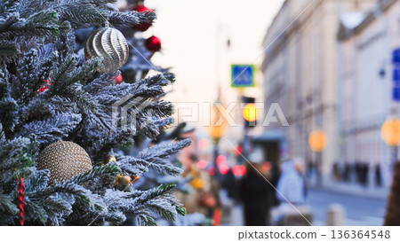 Christmas tree with snow and baubles decorating Moscow street Christmas tree with snow and baubles decorating Moscow street 136364548