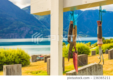 Churchyard in Nes village at fjord, Norway 136365211