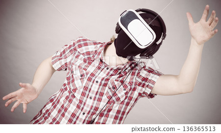 Gamer man wearing VR Gamer man wearing VR 136365513