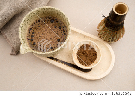Preparing hojicha tea powder with chasen whisk Preparing hojicha tea powder with chasen whisk 136365542