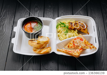 Takeout solyanka soup with mashed potatoes, chicken and cheese toast 136366139