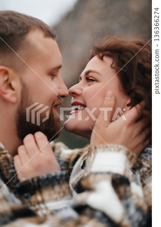 Couple sharing a romantic moment during Valentines Day celebration in nature Couple sharing a romantic moment during Valentines Day celebration in nature 136366274