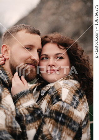 Couple enjoys a moment together in nature on Valentines Day as they celebrate their love and connection 136366275