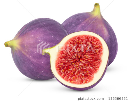Fresh fig and a cut in a half isolated. Two figs and slice with clipping path. Fresh fig and a cut in a half isolated. Two figs and slice with clipping path. 136366331