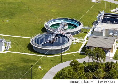 Water treatment facility with multiple tanks and filtration units. Vital infrastructure for sustainable water management and distribution 136366884