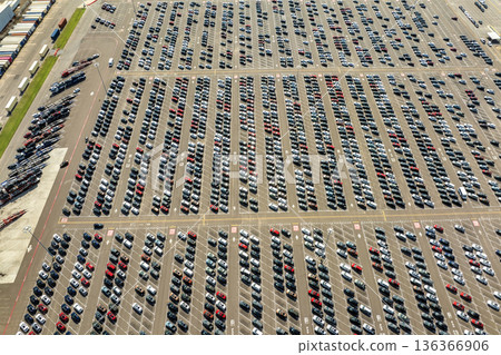 New cars parked on automotive factory parking lot for worldwide export. Dealer vehicle inventory business commercial New cars parked on automotive factory parking lot for worldwide export. Dealer vehicle inventory business commercial 136366906