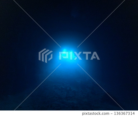 Faint light shining into an underwater cave, Palau, diving scene Faint light shining into an underwater cave, Palau, diving scene 136367314