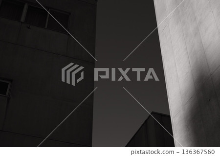 The sky seen through the gaps between buildings, monochrome The sky seen through the gaps between buildings, monochrome 136367560