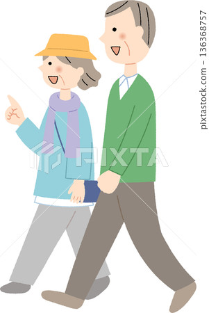 一對面帶著微笑的老夫婦正在散步 一對面帶著微笑的老夫婦正在散步 136368757