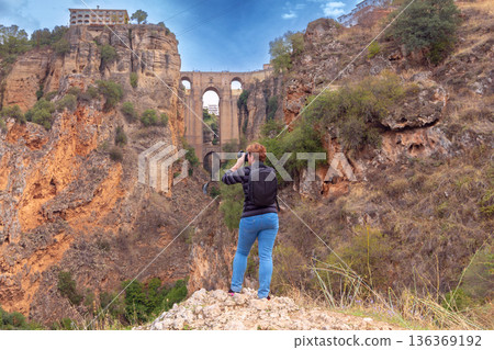 Tourist Photographing Puente Nuevo in Ronda, Spain Tourist Photographing Puente Nuevo in Ronda, Spain 136369192