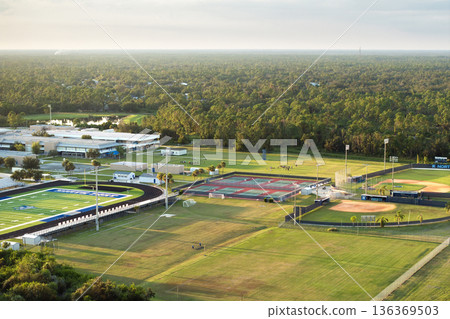High school sports facilities in Florida. American football stadium, tennis court and baseball diamond sport infrastructure High school sports facilities in Florida. American football stadium, tennis court and baseball diamond sport infrastructure 136369503